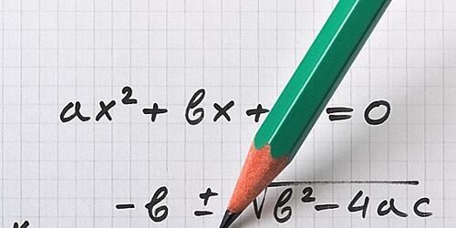 quadratic equation on graph paper with pencil